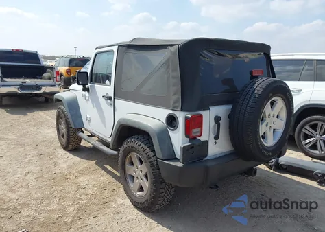 2011 Jeep Wrangler Sport z USA, uszkodzony, nr VIN 1J4AA2D15BL608561